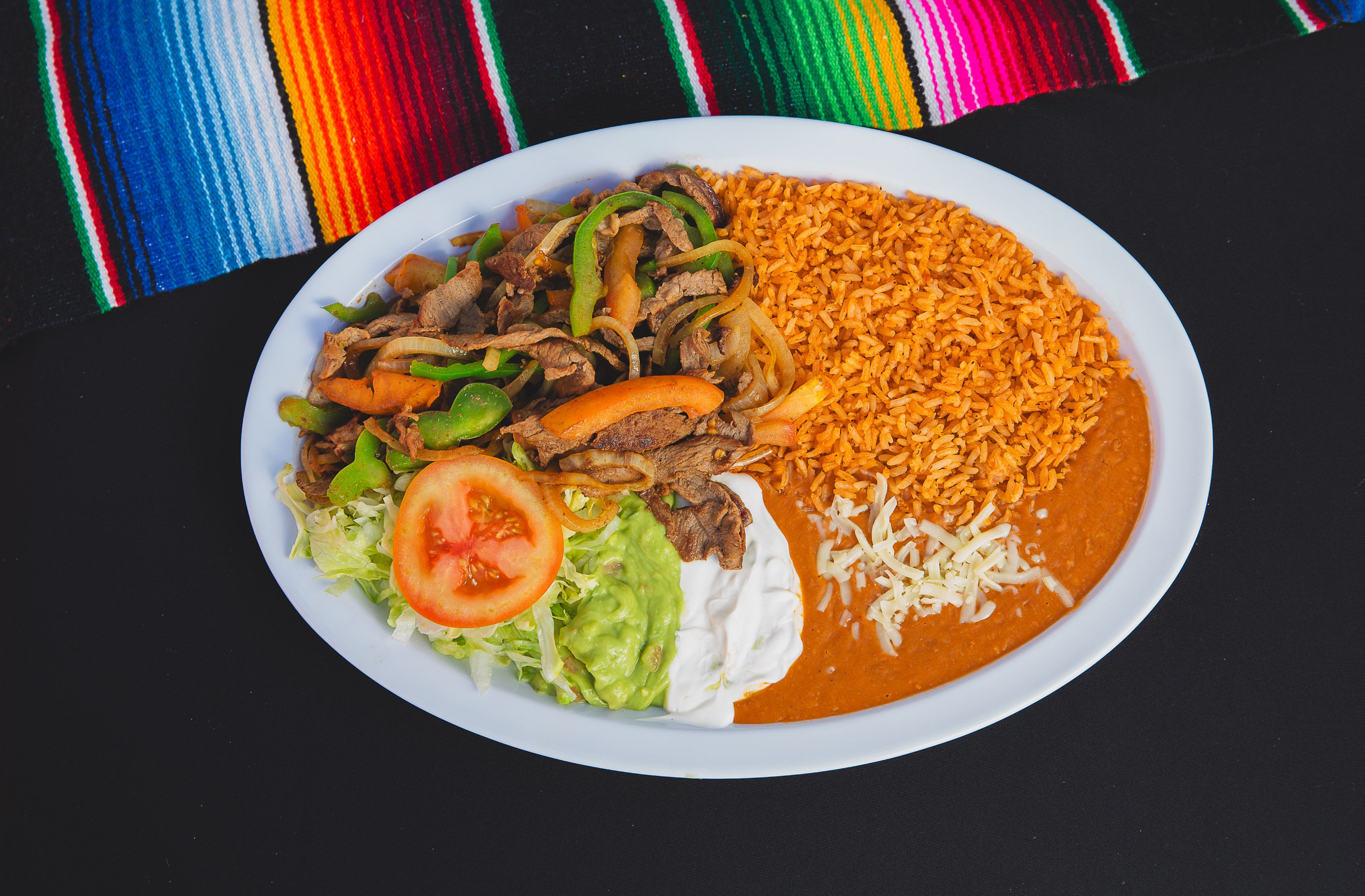 FAJITAS (BEEF OR CHICKEN)